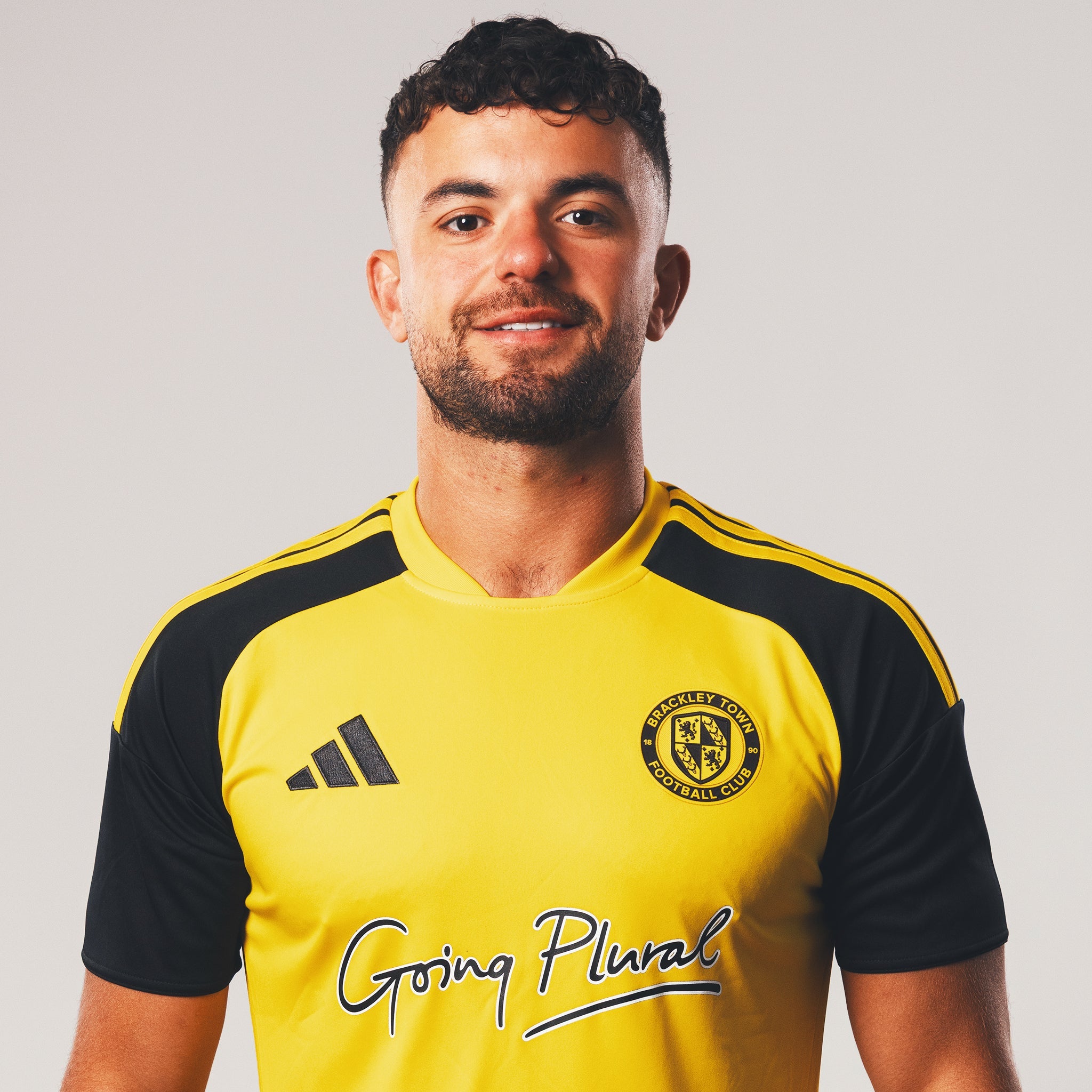 Brackley Town FC official third shirt 2026/27 by Adidas — bold yellow with black sleeves, available in adult and junior sizes